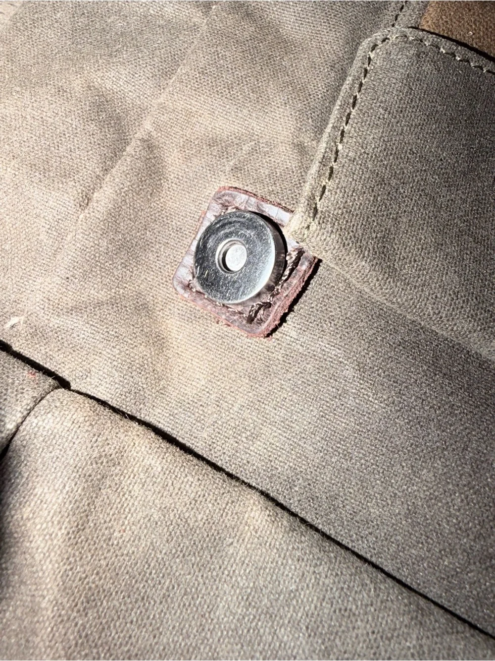 Waxed Canvas Roll-Top Backpack in army green and Brown